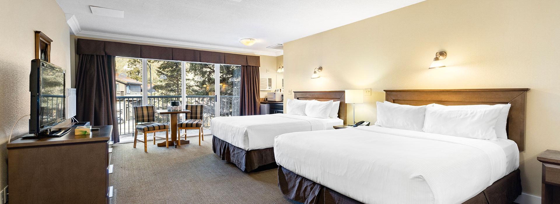 Standard hotel room with 2 queen beds