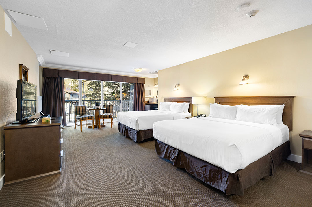 Standard hotel room with two queen beds